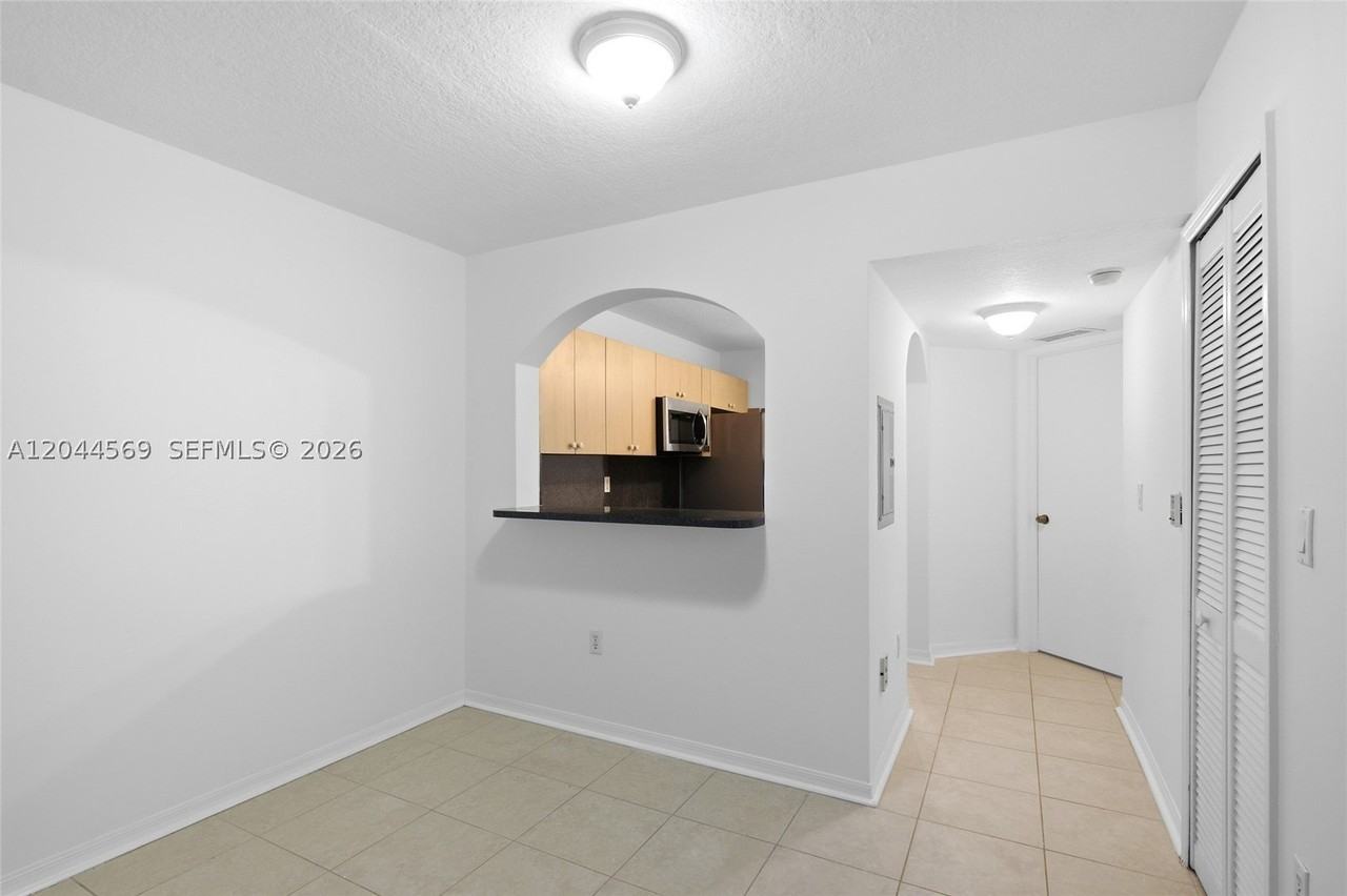 1251 Se 29th St #102-26 - Photo 5 of 12