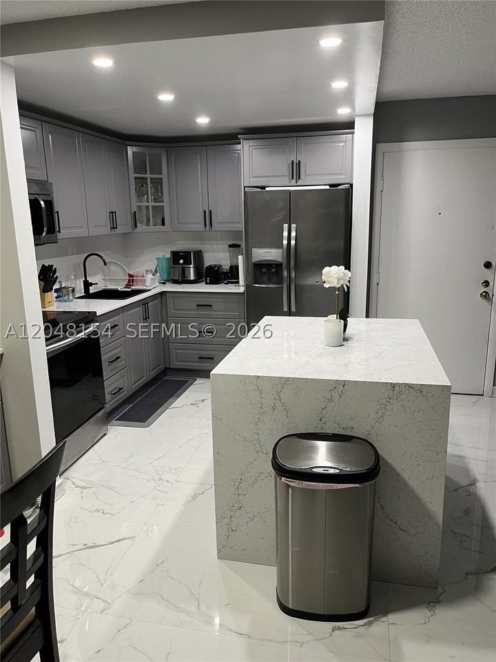 819 Ne 199th St #6-101 - Photo 2 of 10