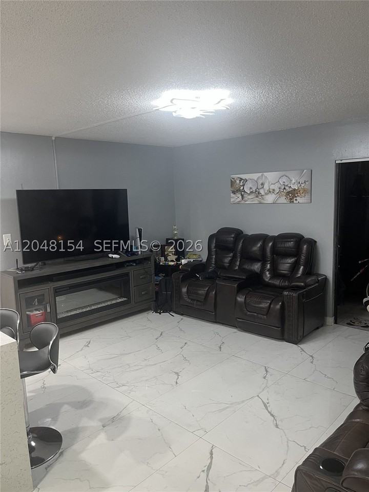 819 Ne 199th St #6-101 - Photo 4 of 10