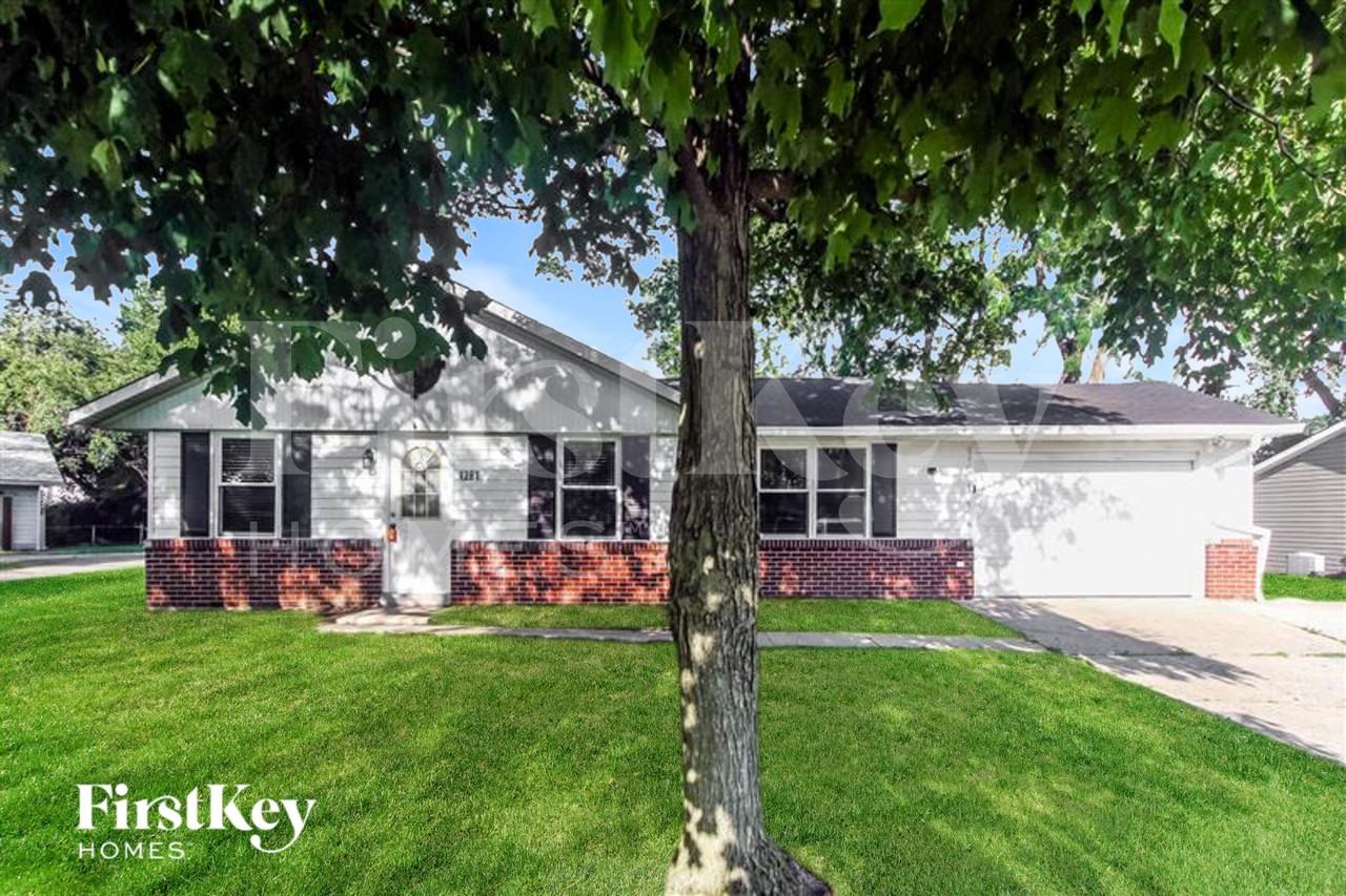 1281 Tree Top Ln - Photo 2 of 16