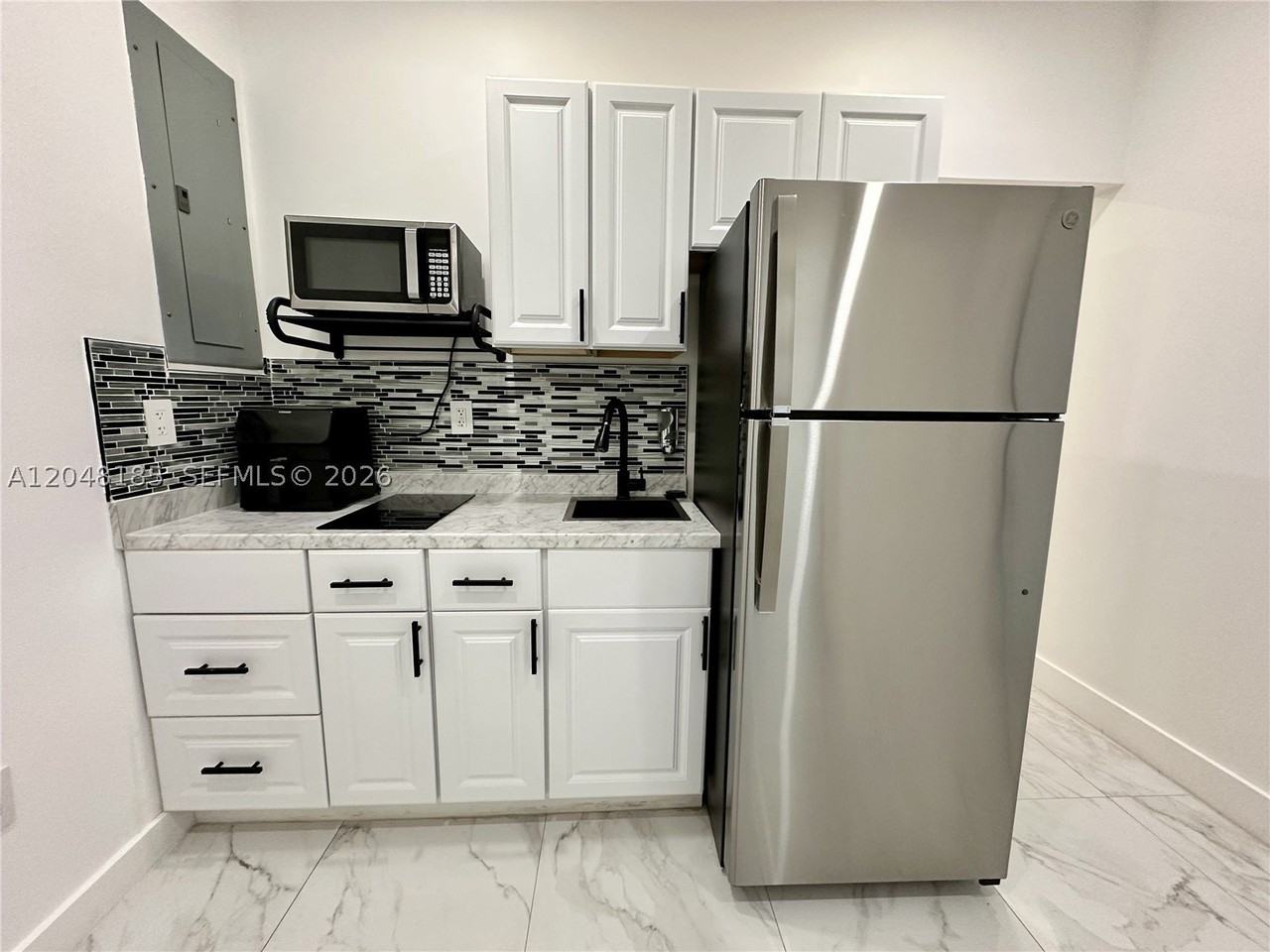 1309 Nw 55th Ter - Photo 2 of 20