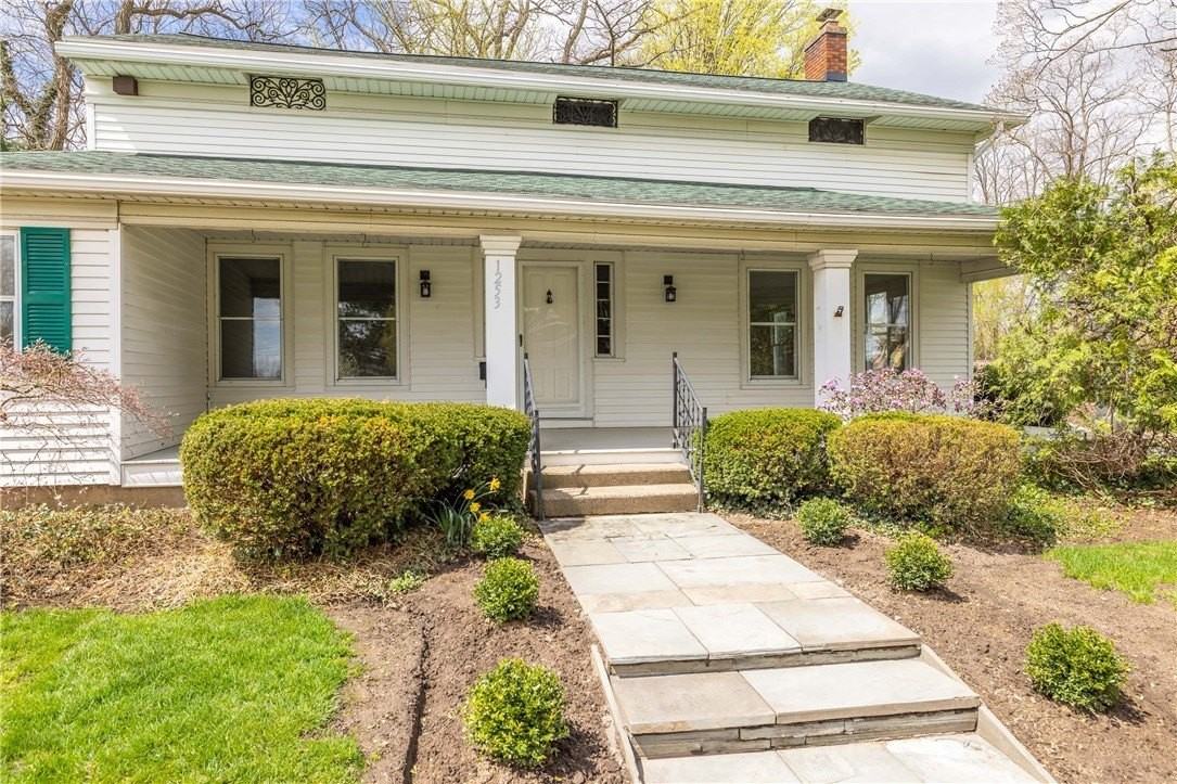 1253 Fairport Rd - Photo 3 of 31