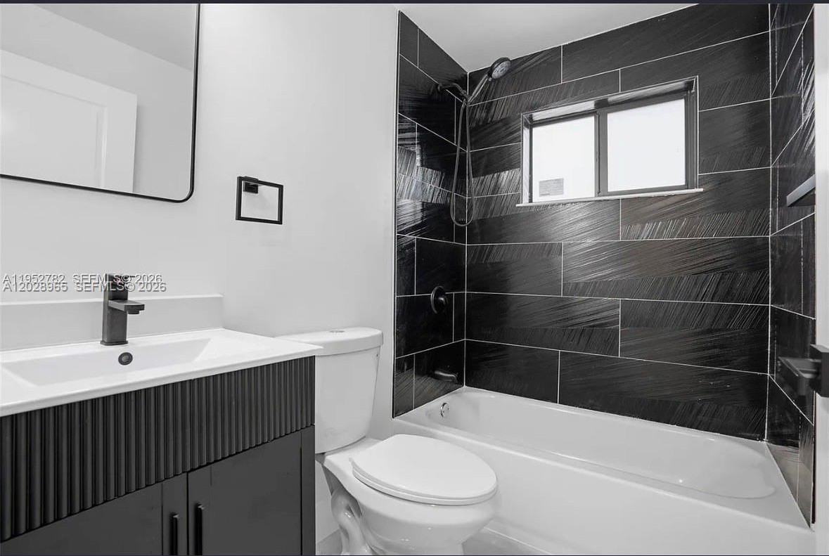 1411 Nw 40th St - Photo 6 of 8