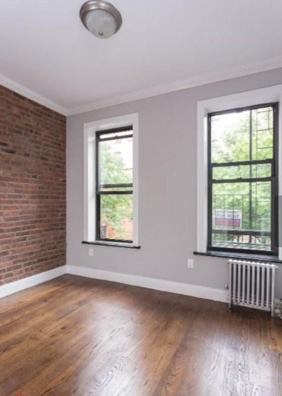 W 108th St #1 - Photo 2 of 4