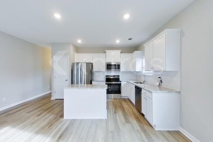 7321 Foggy River Dr - Photo 4 of 24