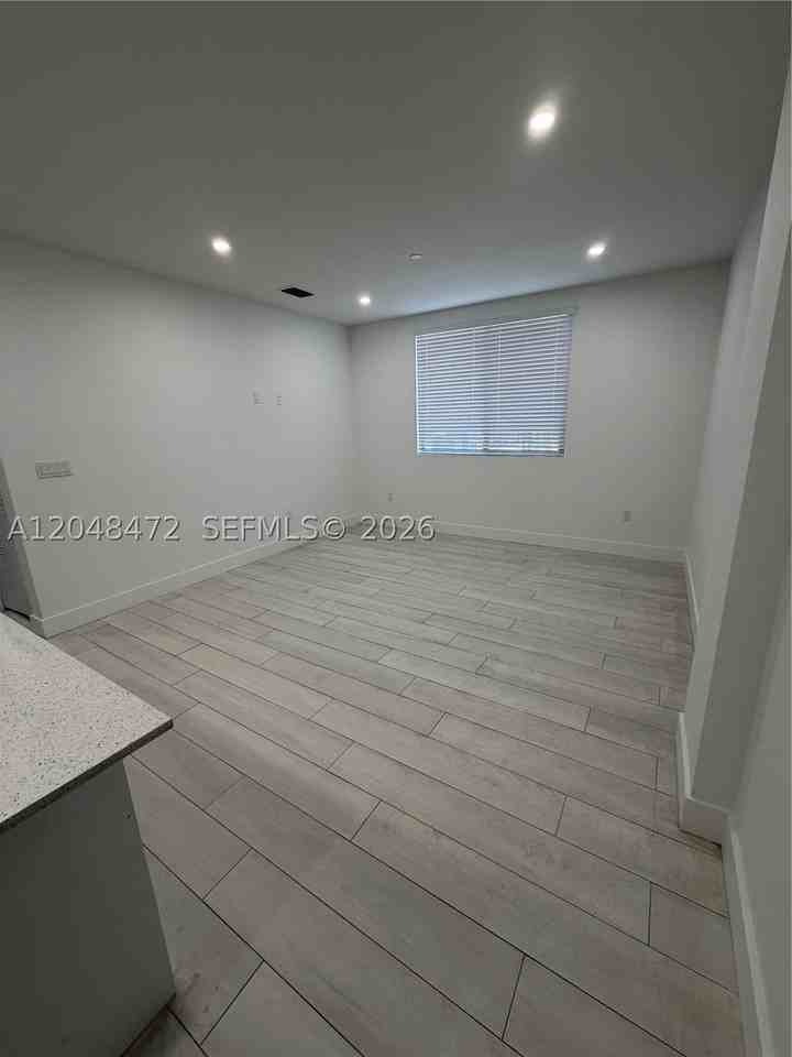 879 E 24th St #203 - Photo 2 of 12