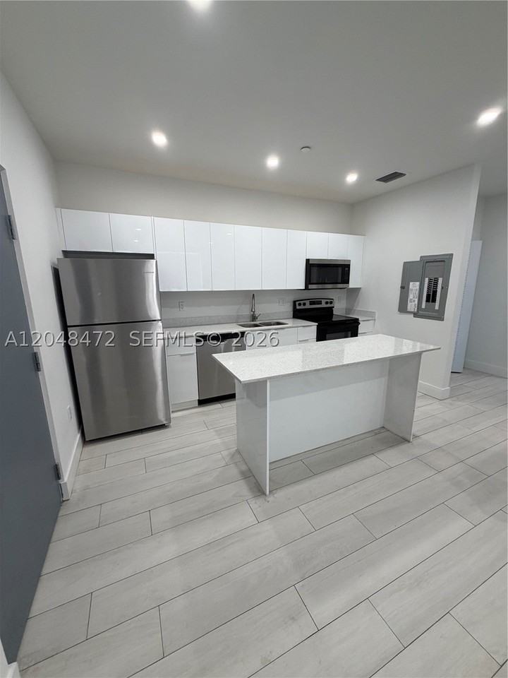 879 E 24th St #203 - Photo 3 of 12