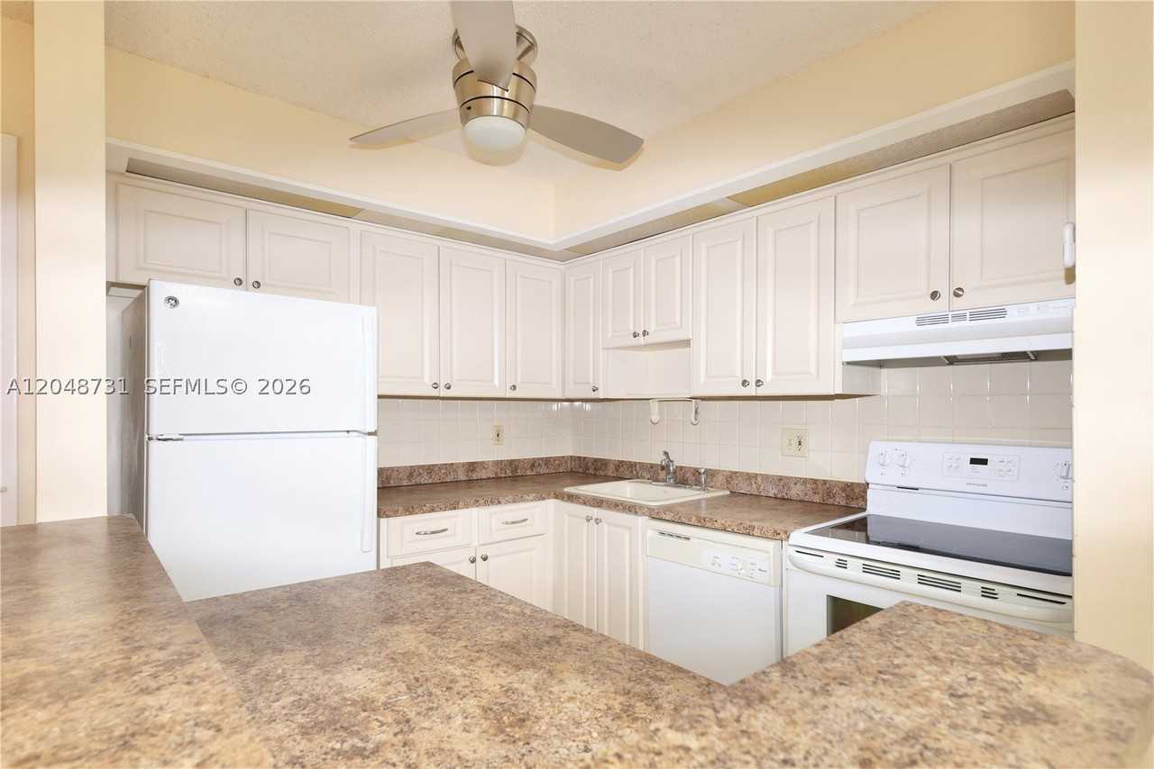 9448 S Belfort Cir #116 - Photo 2 of 18