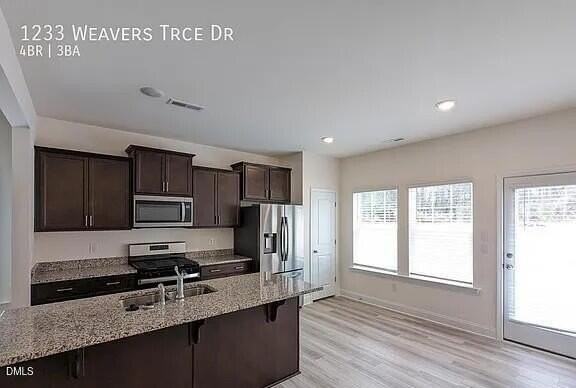 1233 Weavers Trace Dr - Photo 3 of 14