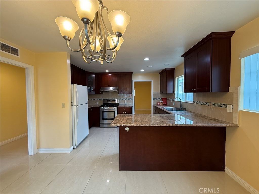 1127 S Nantes Ave - Photo 6 of 23