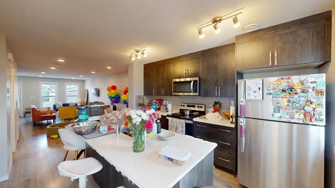1414 - 7451 Falconridge Boulevard Northeast - Photo 3 of 12