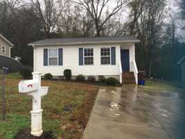 featured image of 1 Riverside Cottage Ln