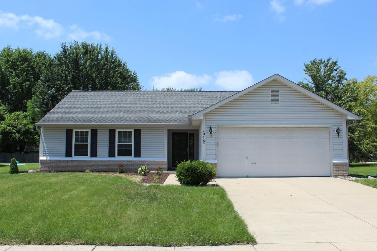612 Woodfield Cir - Photo 2 of 17