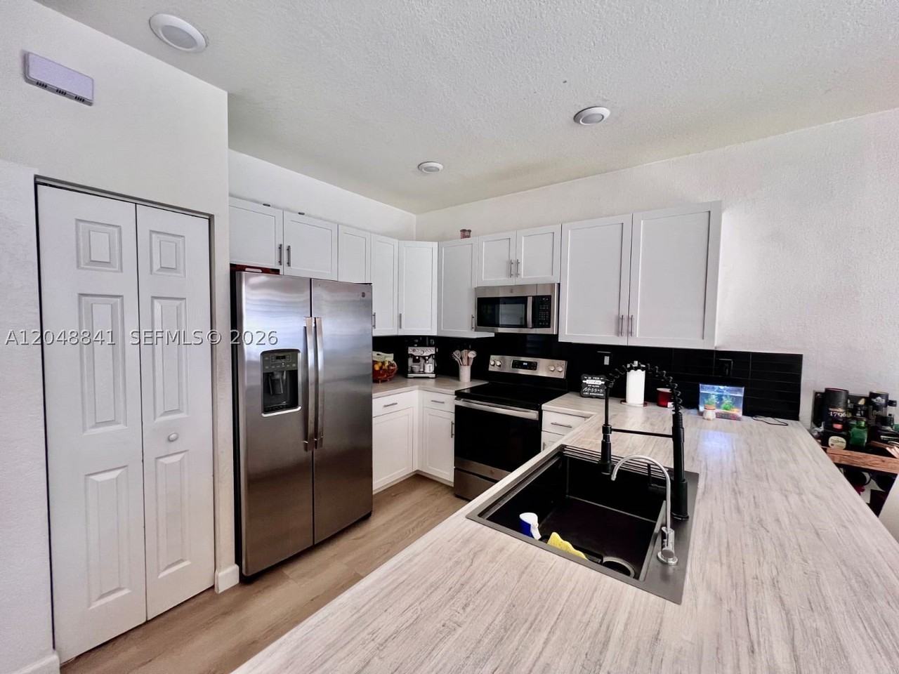 10939 W 32nd Ln - Photo 4 of 24