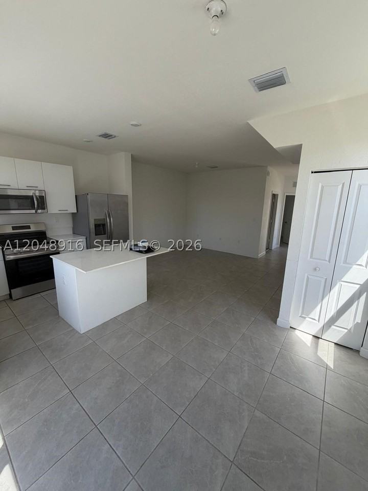 12213 Nw 23rd Pl #12213 - Photo 7 of 14
