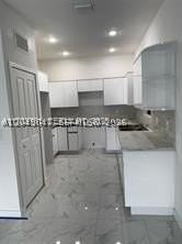 1717 Nw 70th St - Photo 3 of 10