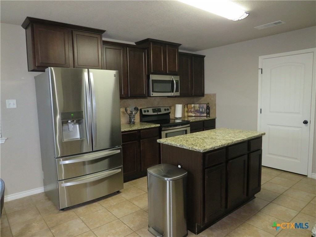 9805 Kaitlyn Dr - Photo 5 of 33