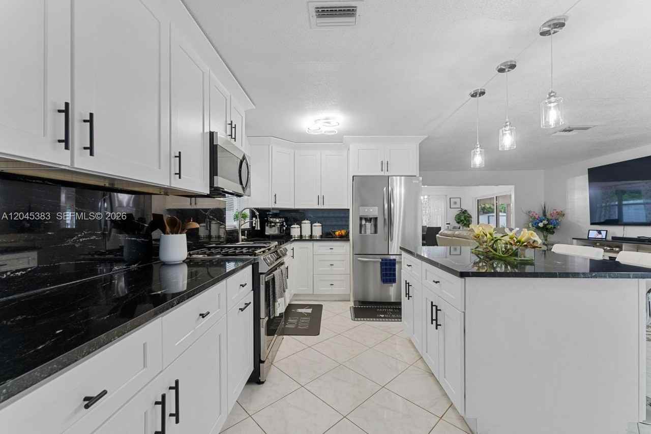 9508 North Military Trail - Photo 7 of 21