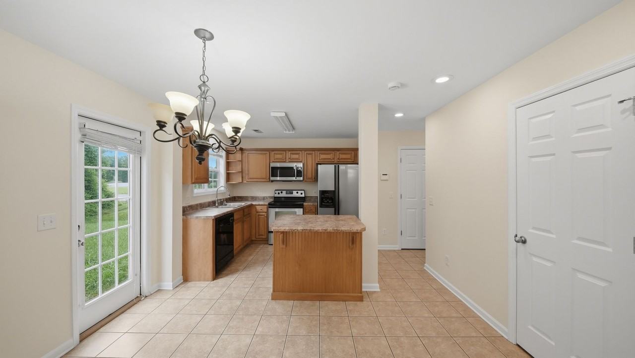 7100 Blossom Cir - Photo 5 of 16