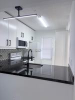 featured image of 8305 Royal Palm Blvd #103