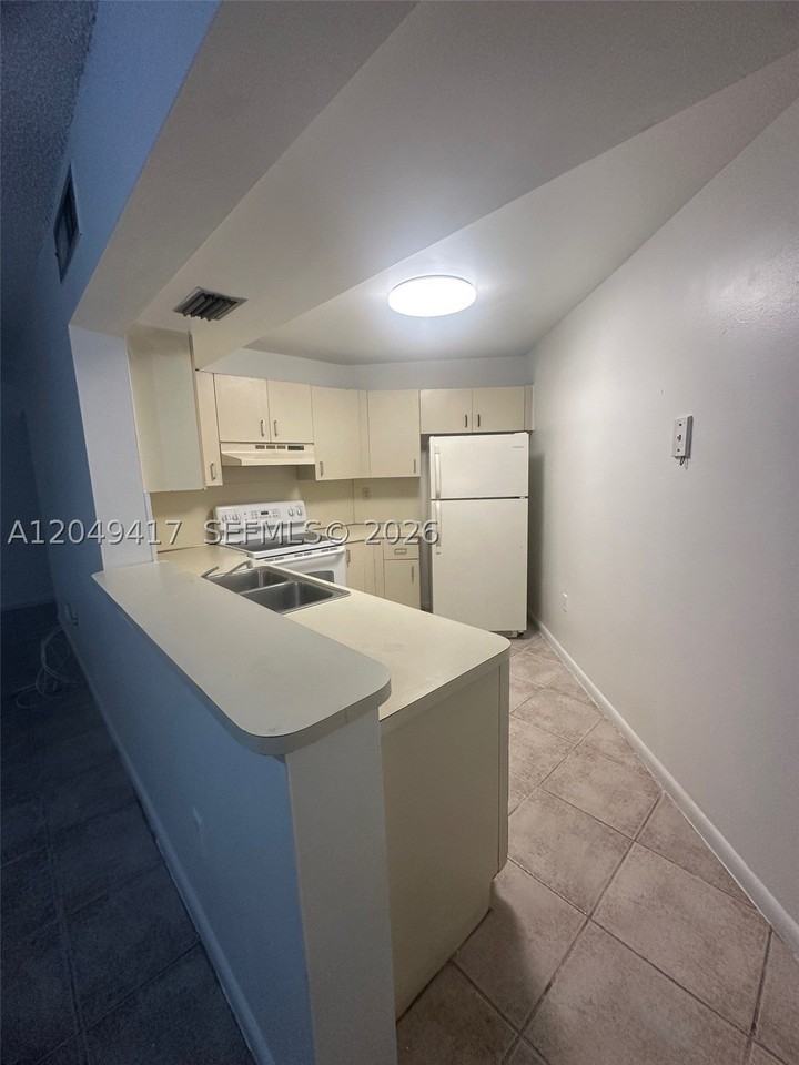 9741 Fontainebleau Blvd #H109 - Photo 4 of 19