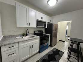 140 Nw 13th St #150-5 - Photo 1 of 1