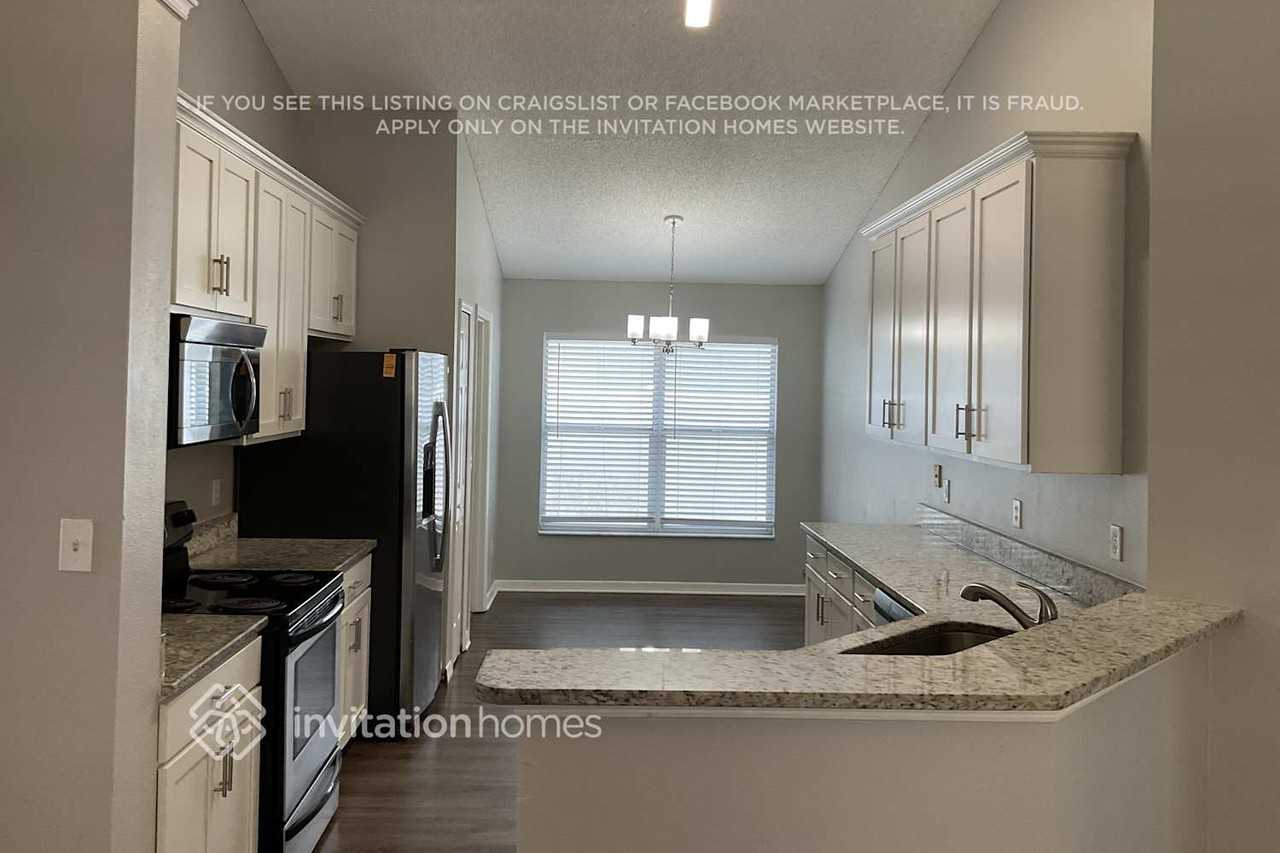 11969 Hatcher Cir - Photo 3 of 12