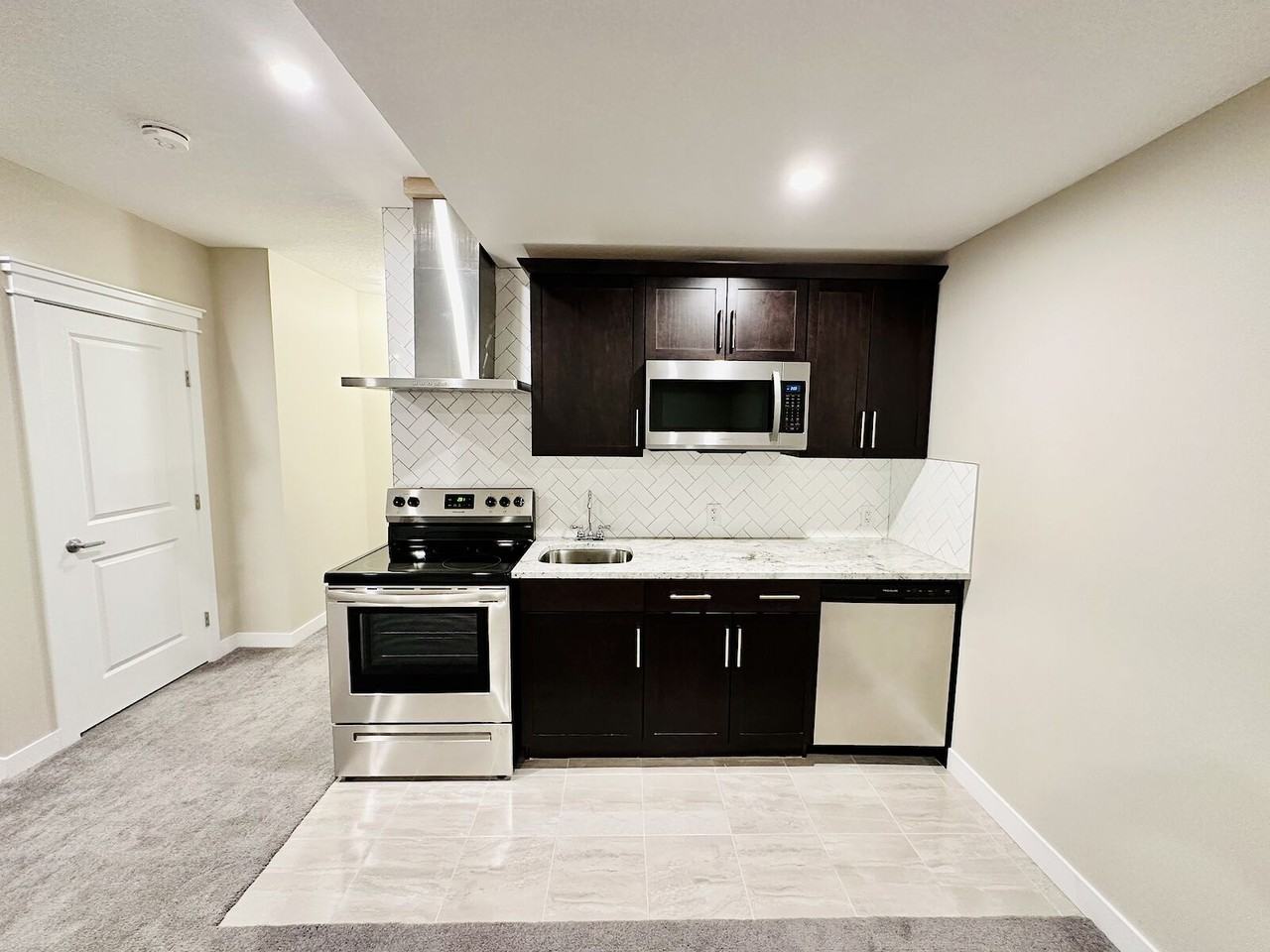 Lower, 109 Evanscrest Road NW - Photo 4 of 12