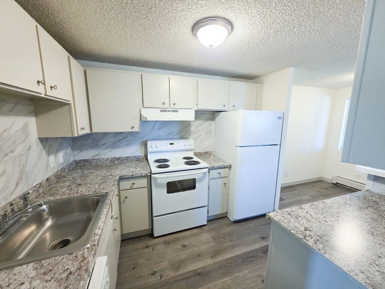 Sunstone Apartments - Photo 3 of 38