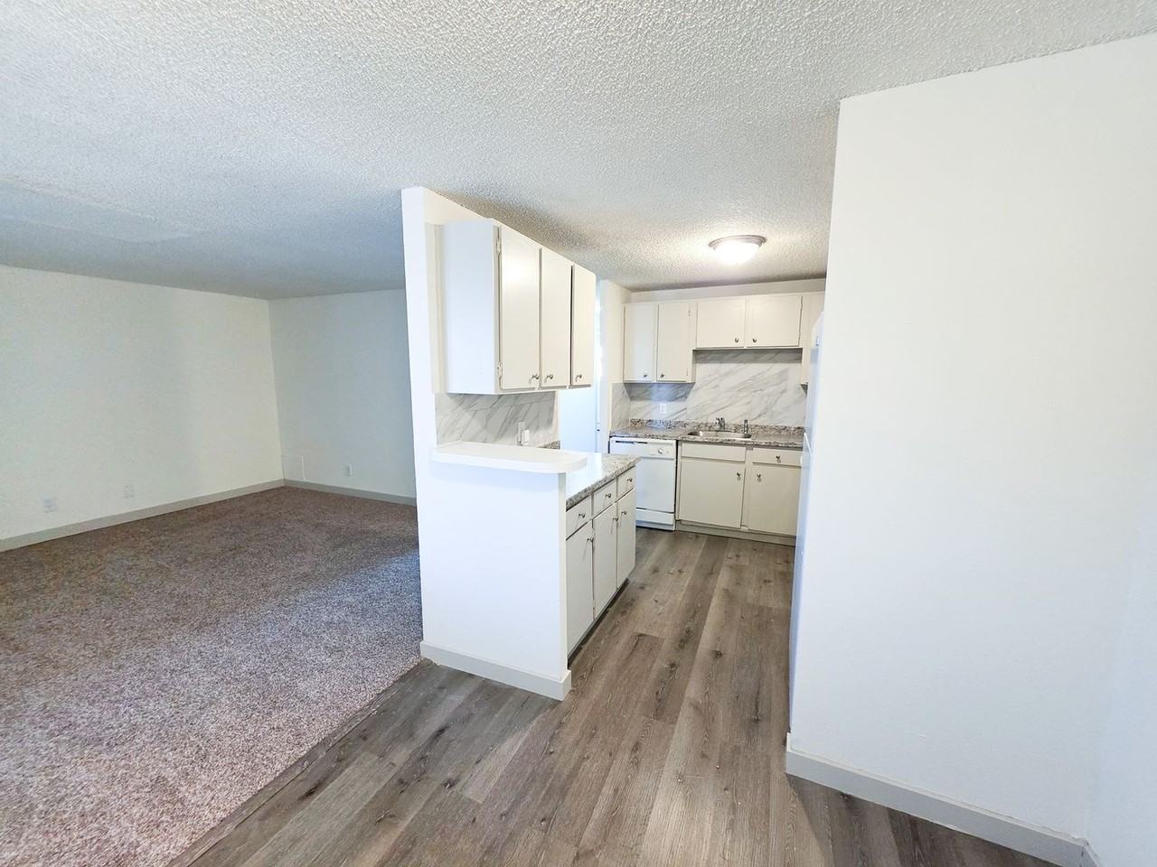 Sunstone Apartments - Photo 4 of 38
