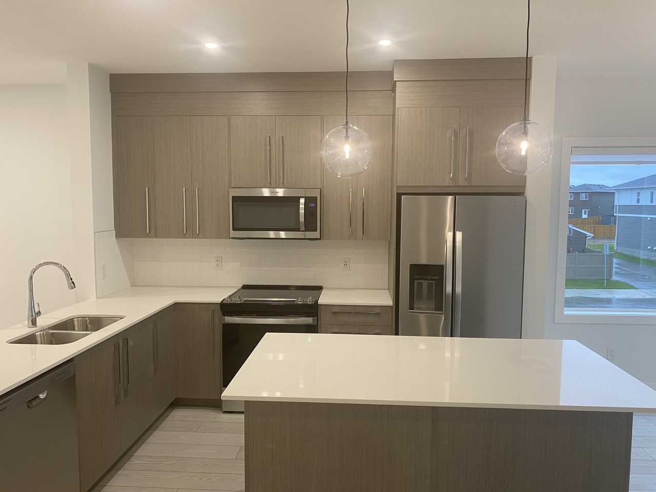 4 Bedroom 2.5 Bathroom Townhouse in Chestermere - Photo 5 of 46