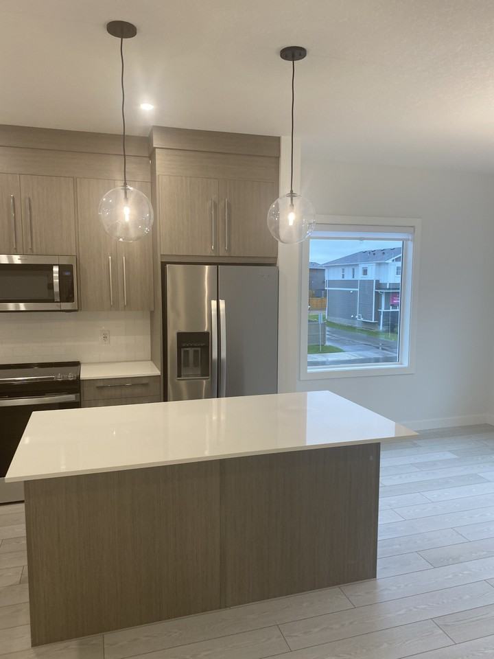 4 Bedroom 2.5 Bathroom Townhouse in Chestermere - Photo 6 of 46