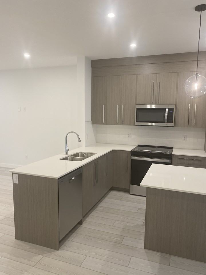 4 Bedroom 2.5 Bathroom Townhouse in Chestermere - Photo 7 of 46