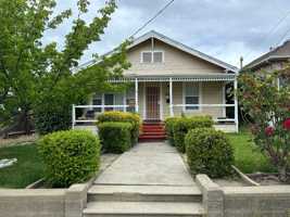 featured image of 112 W 5th St