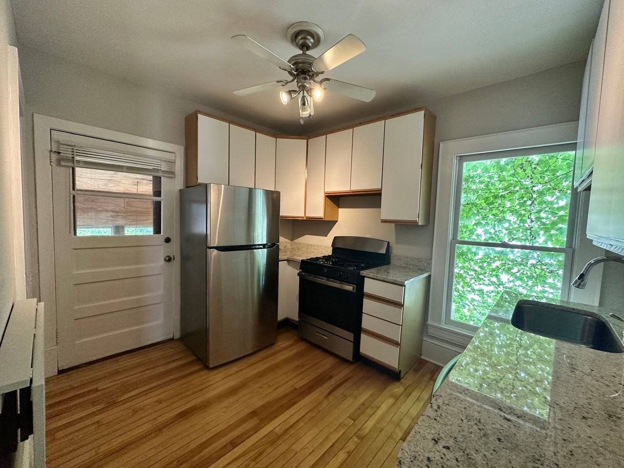 Historic Charm Meets Modern Living in the Heart of Lowry Hill - Photo 3 of 23