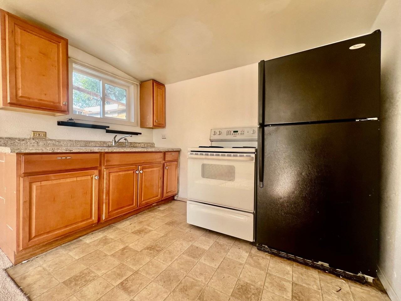 3977 S Acoma St - Photo 4 of 9