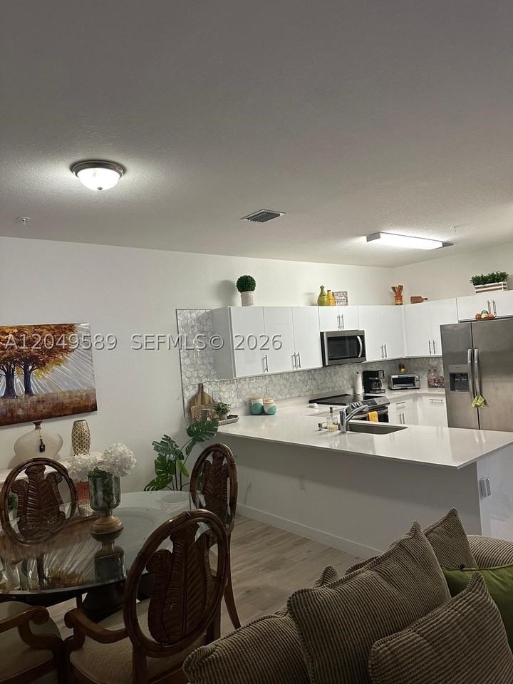 15540 Sw 136th St #109 - Photo 6 of 13