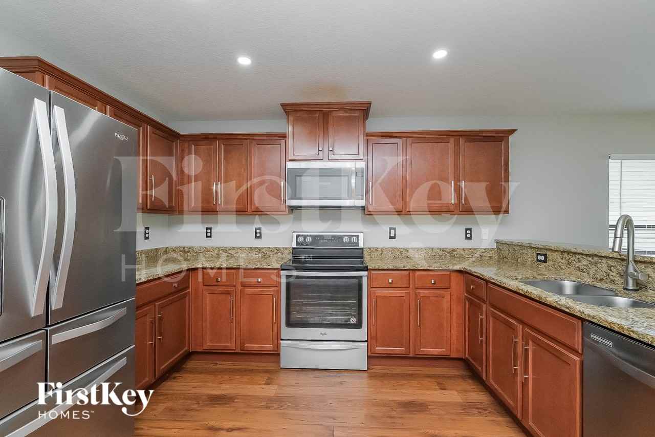 11867 Thicket Wood Dr - Photo 4 of 18