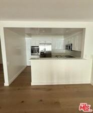 18071 Coastline Dr #16 - Photo 3 of 6