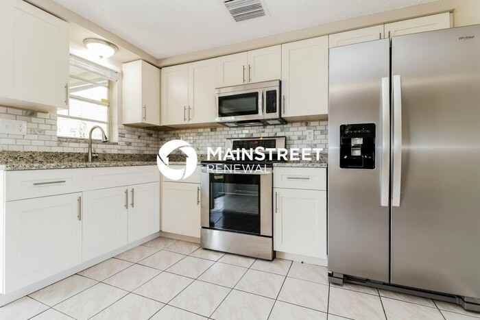 2115 Harrison Dr - Photo 6 of 15