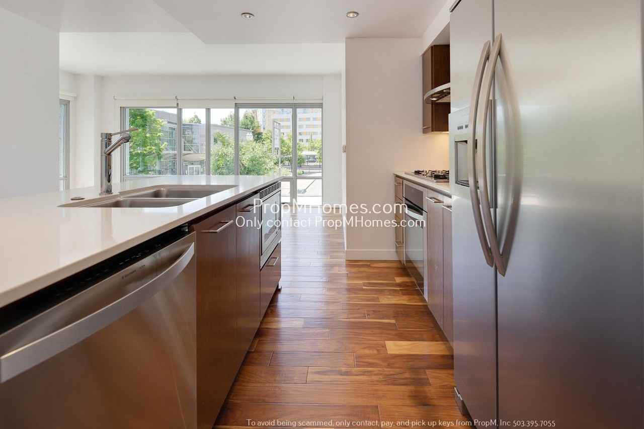 1260 Nw Naito Pkwy #210 - Photo 7 of 25
