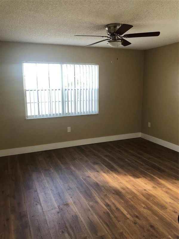 9910 W Heather Ln - Photo 7 of 9