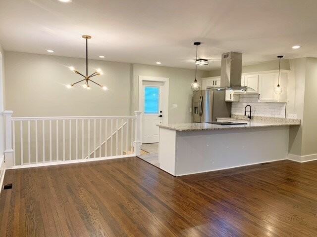 731 W 43rd St - Photo 7 of 20