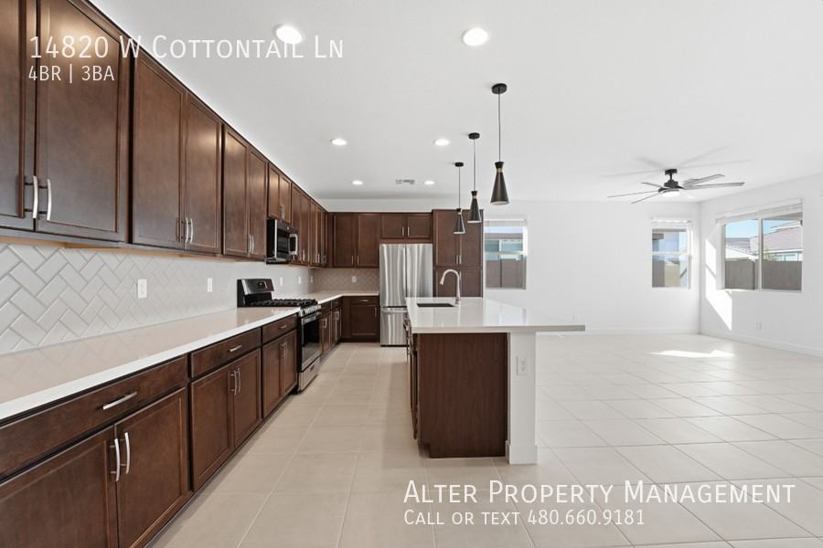 14820 W Cottontail Ln - Photo 4 of 30
