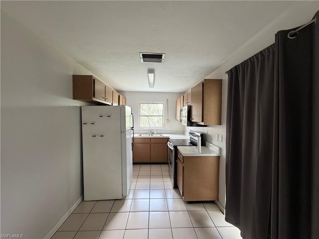 2521 Se 16th Pl Lot 53 - Photo 4 of 7
