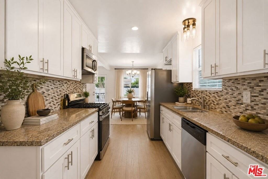 6033 Fallbrook Ave - Photo 2 of 17