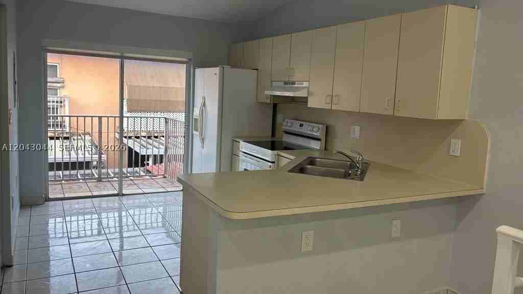 6891 W 36th Ave #202 - Photo 4 of 8