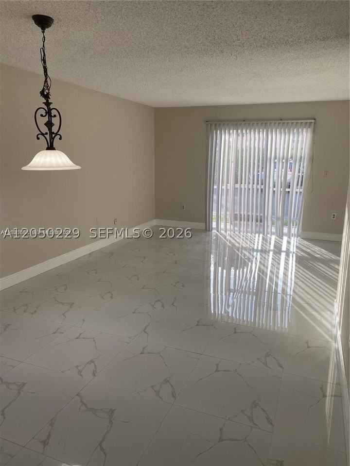 11307 Sw 200th St #106B - Photo 2 of 12