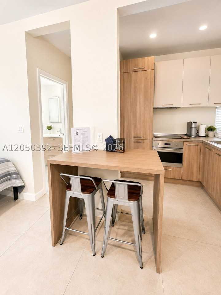 245 Ne 33rd St #101 - Photo 3 of 10