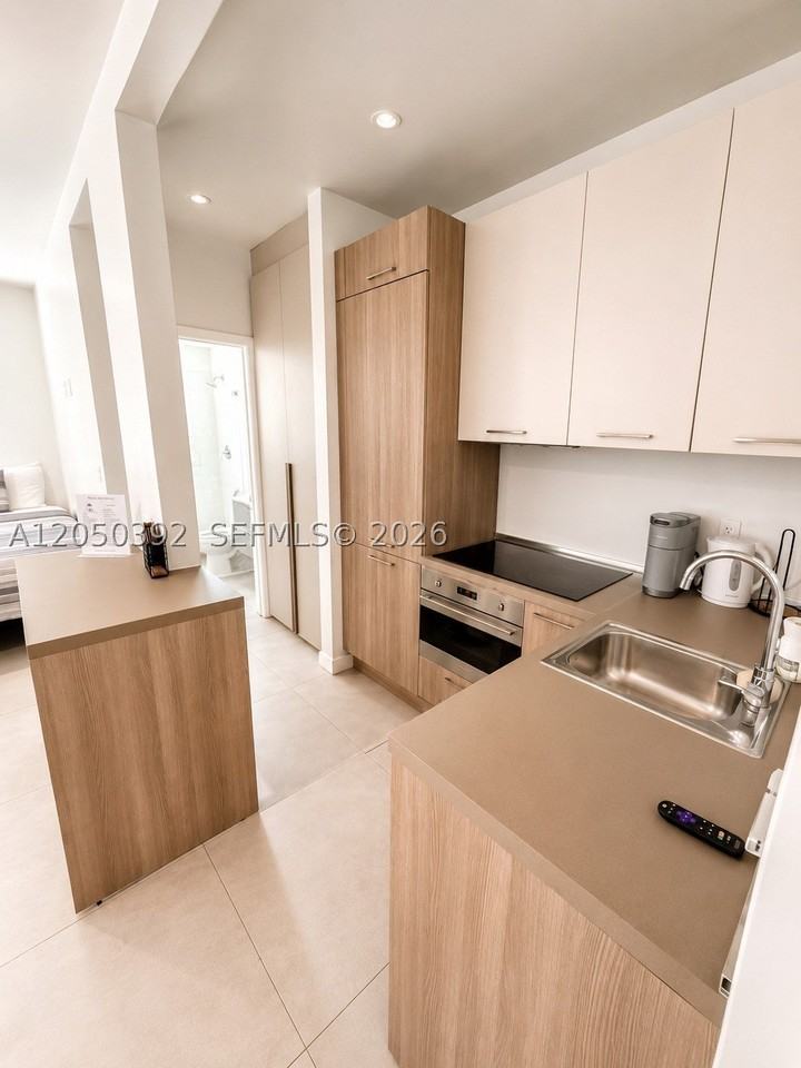 245 Ne 33rd St #101 - Photo 5 of 10